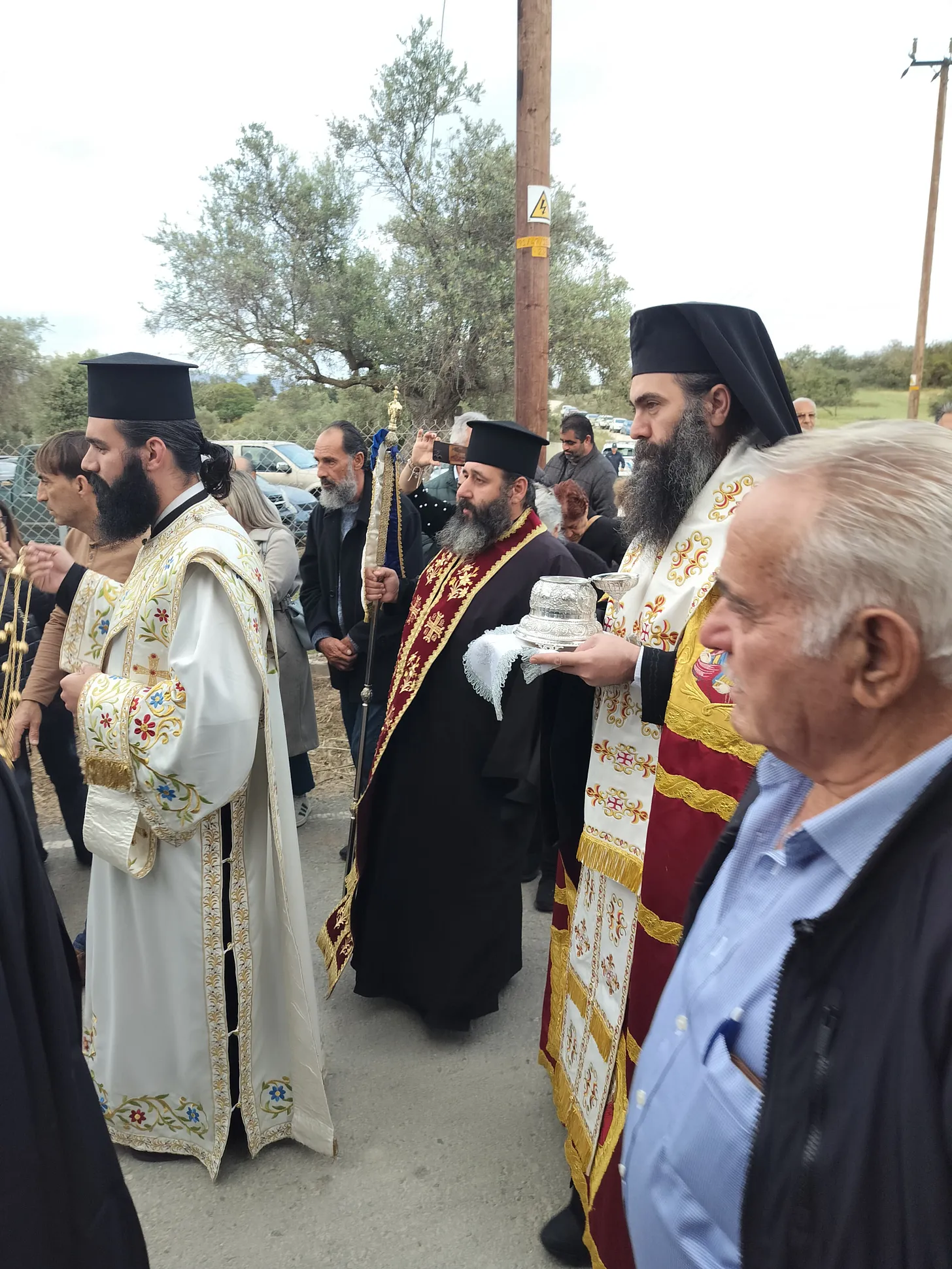 Met. Tychicus and clergy processing towards the church with the relics of St. George.